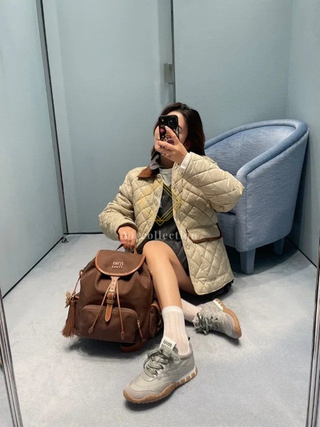 미우미우 퀼팅 테크니컬 퐁제 블루종 자켓